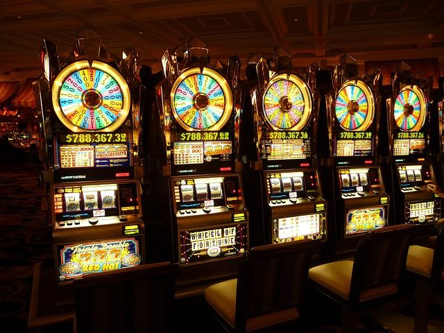 slot machine, one-armed bandit, money