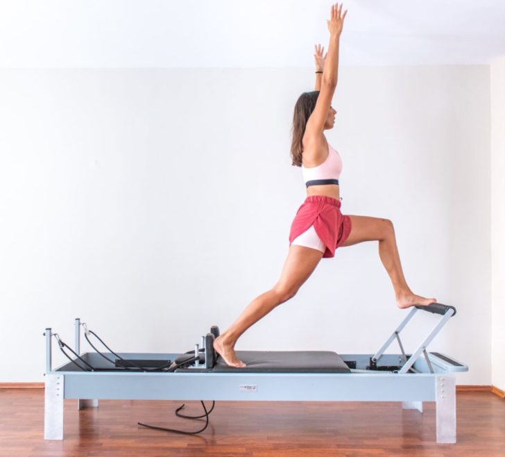 Photo by Maria Charizani: https://www.pexels.com/photo/side-view-of-a-woman-in-activewear-doing-pilates-reformer-exercise-5473899/