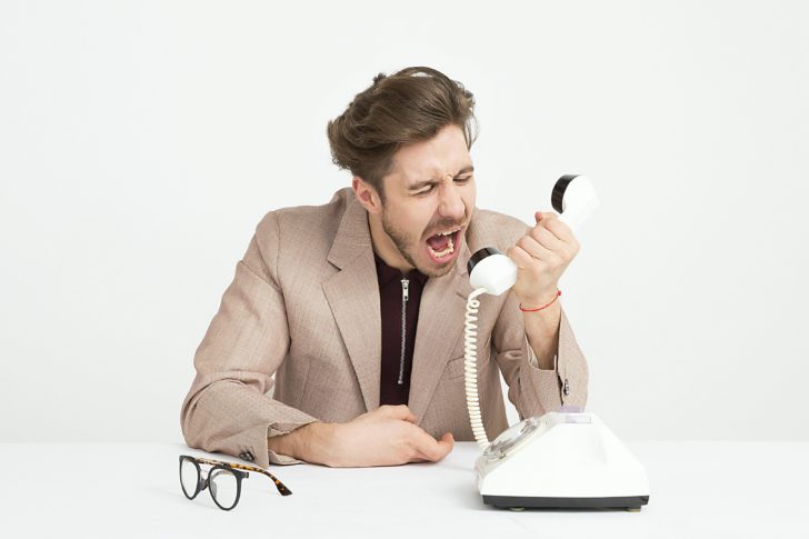 Photo by Moose Photos: https://www.pexels.com/photo/man-wearing-brown-suit-jacket-mocking-on-white-telephone-1587014/