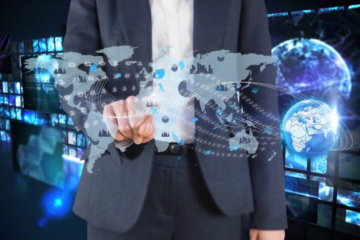 man playing virtual reality map How Enterprise Technology Is Transforming Global Business Operations